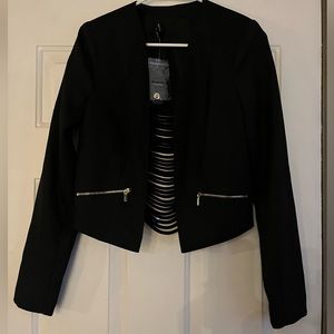 - Bebe blazer with ladder like back design